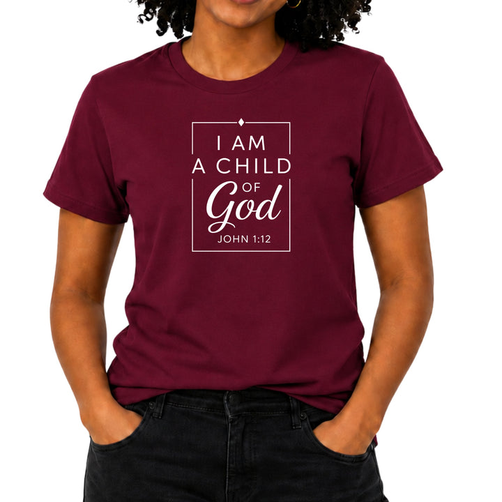 Burgundy t-shirt with "I am a child of God John 1:12" text.