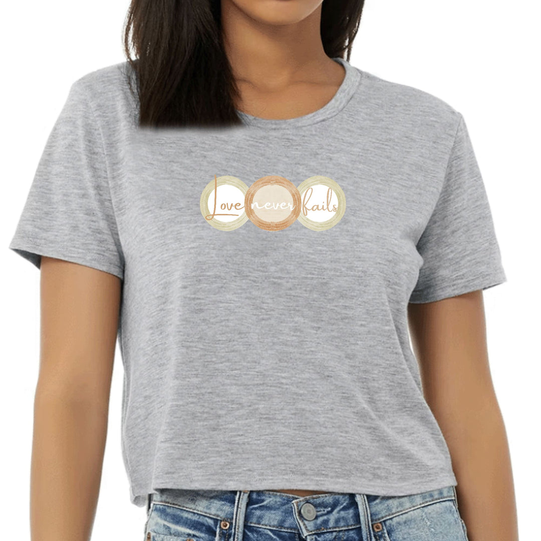 Womens Cropped Graphic T-shirt Love Never Fails Pastel Brown Beige - Womens