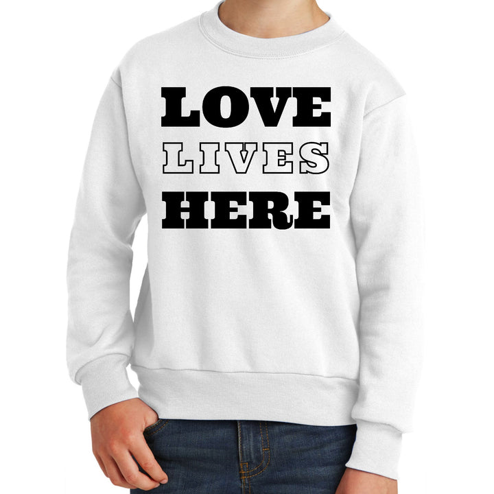 Youth Graphic Sweatshirt Love Lives Here - Youth | Sweatshirts